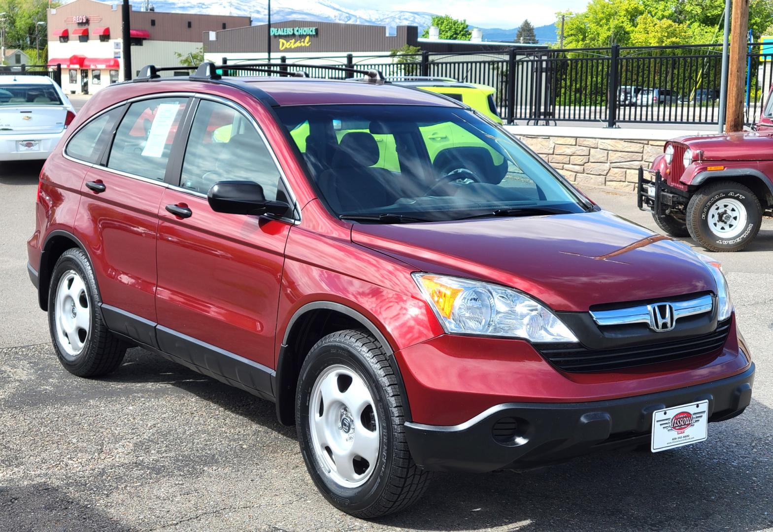 2009 Red /Gray Honda CR-V LX (5J6RE483X9L) with an 2.4L L4 engine, 5 Speed Automatic transmission, located at 450 N Russell, Missoula, MT, 59801, (406) 543-6600, 46.874496, -114.017433 - Great Running AWD SUV. 2.4L I4 Engine. 5 Speed Automatic Transmission. Air. Cruise. Tilt. Power Windows and Locks. New Tires. Roof Rack. Does have a Rebuilt Title so financing is not available. - Photo#3